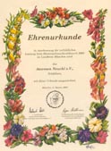 Ehrenurkunde mit Blumenschmuck